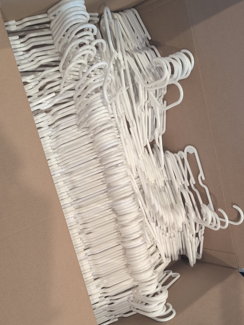 Over 100 White Kids Plastic Clothing Hangers - Lot